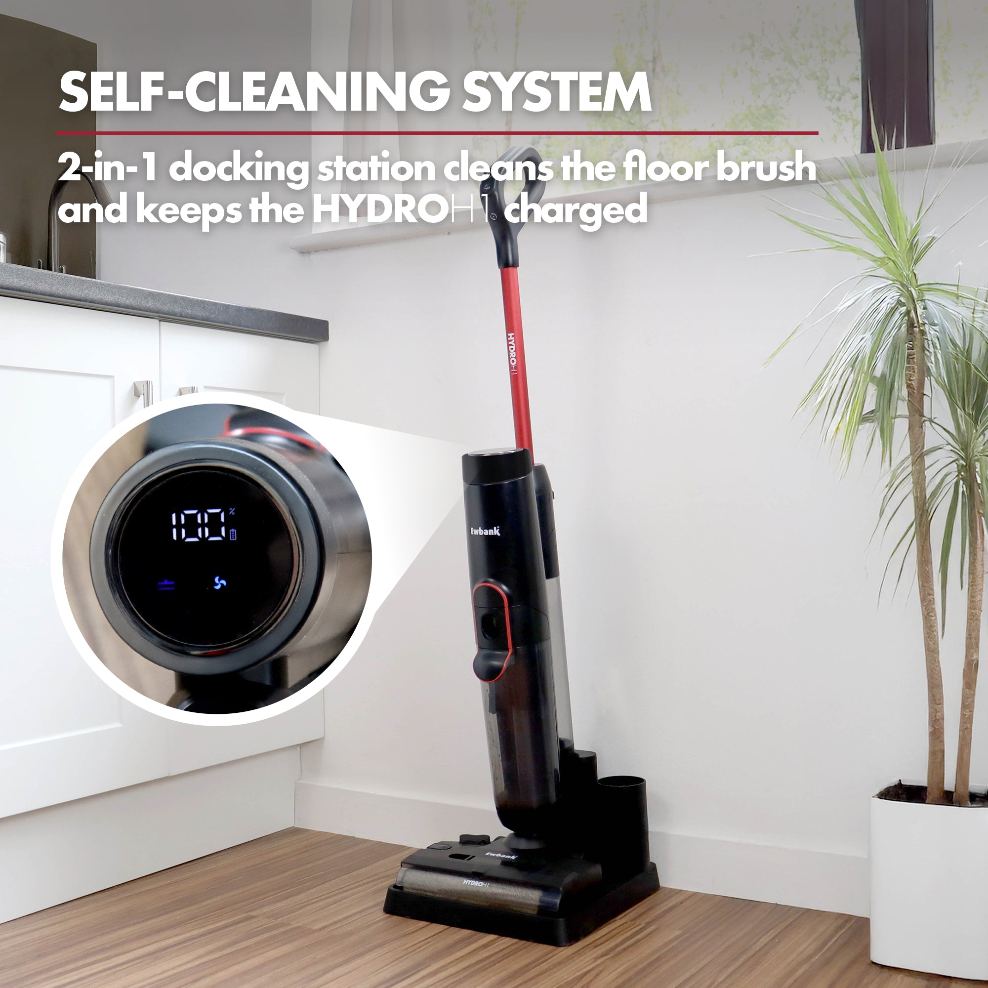 The HYDROH1 Cordless Hard Floor Cleaner, a black and red 2-in-1 wet & dry vacuum, stands on its docking station in a bright kitchen. An inset shows the digital display, with text noting its self-cleaning system and dual-purpose docking station.