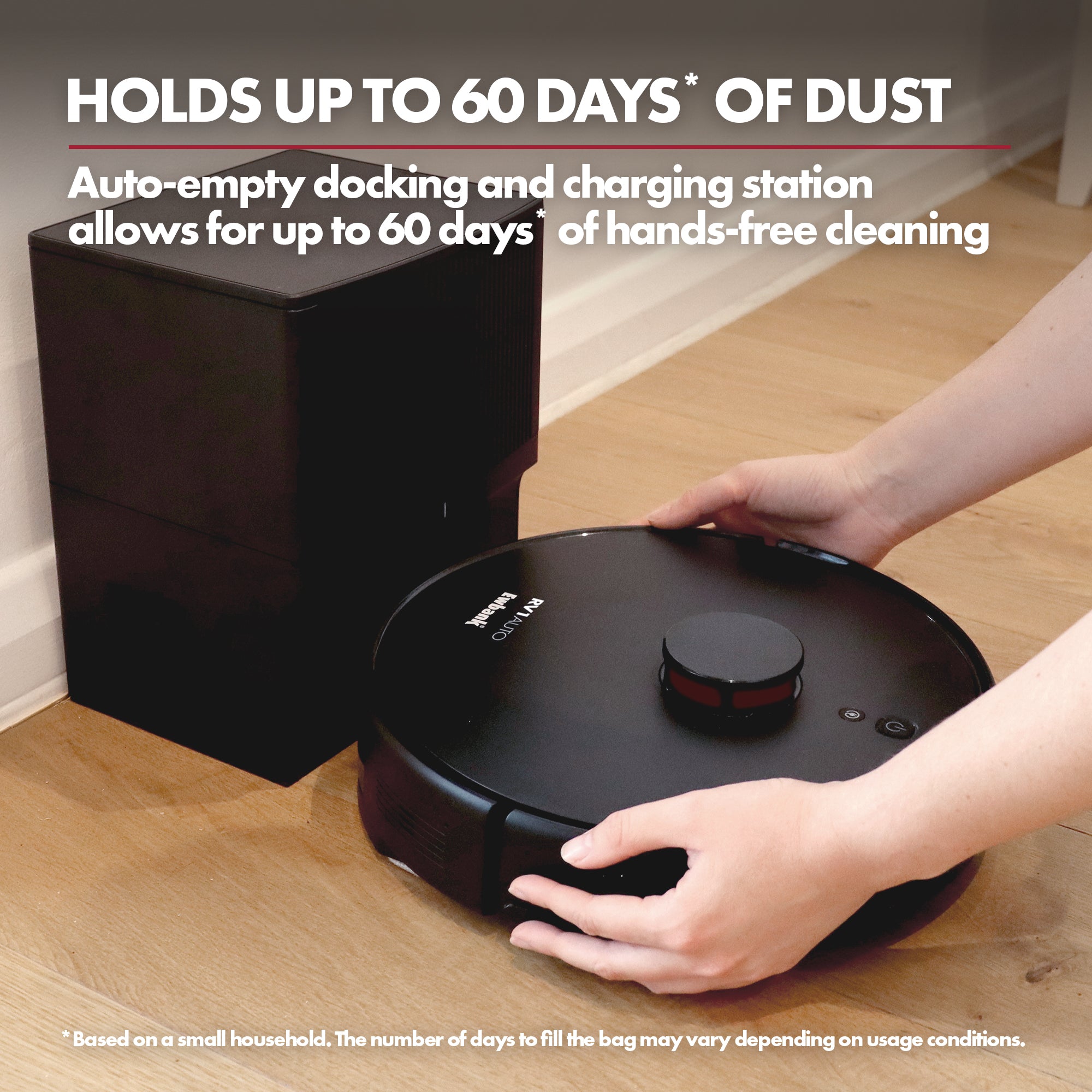 A person places the Ewbank EWVC04604 RV1AUTO Robot Vacuum next to its black auto-empty dock, which stores up to 60 days of dust for hands-free cleaning controlled via the Smart Life app.