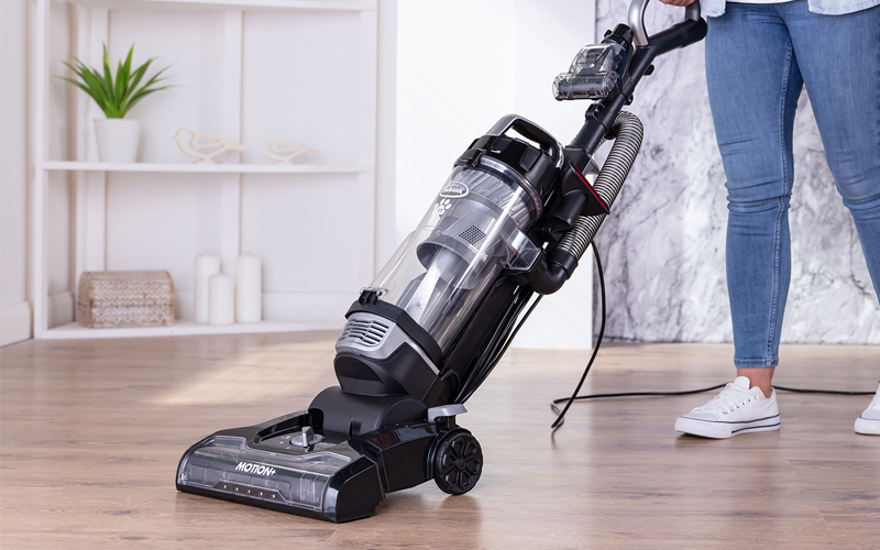 MOTION+ vacuum cleaner being used on hard floor